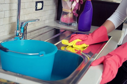 Cleaner refreshing a mattress in a Stjohnswood flat or apartment